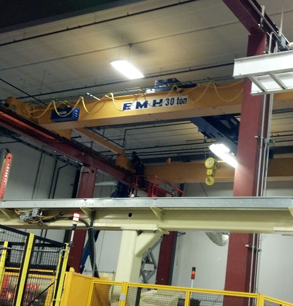 Custom 30 Ton capacity top running double box girder crane servicing injection mold machines