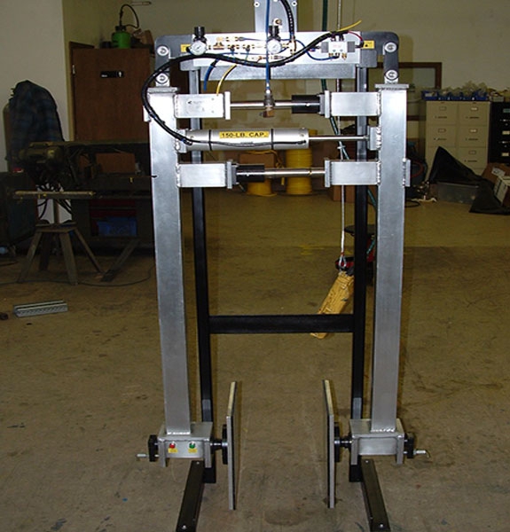 Air powered OD clamp with manual rotation